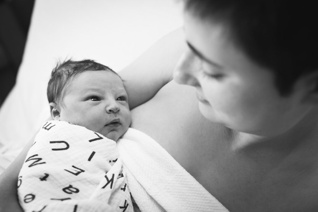 newborn closeup with mother photo