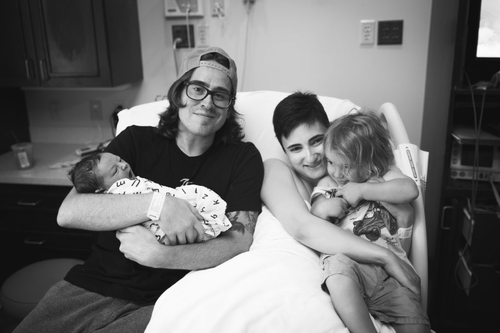 big brother with newborn in hospital