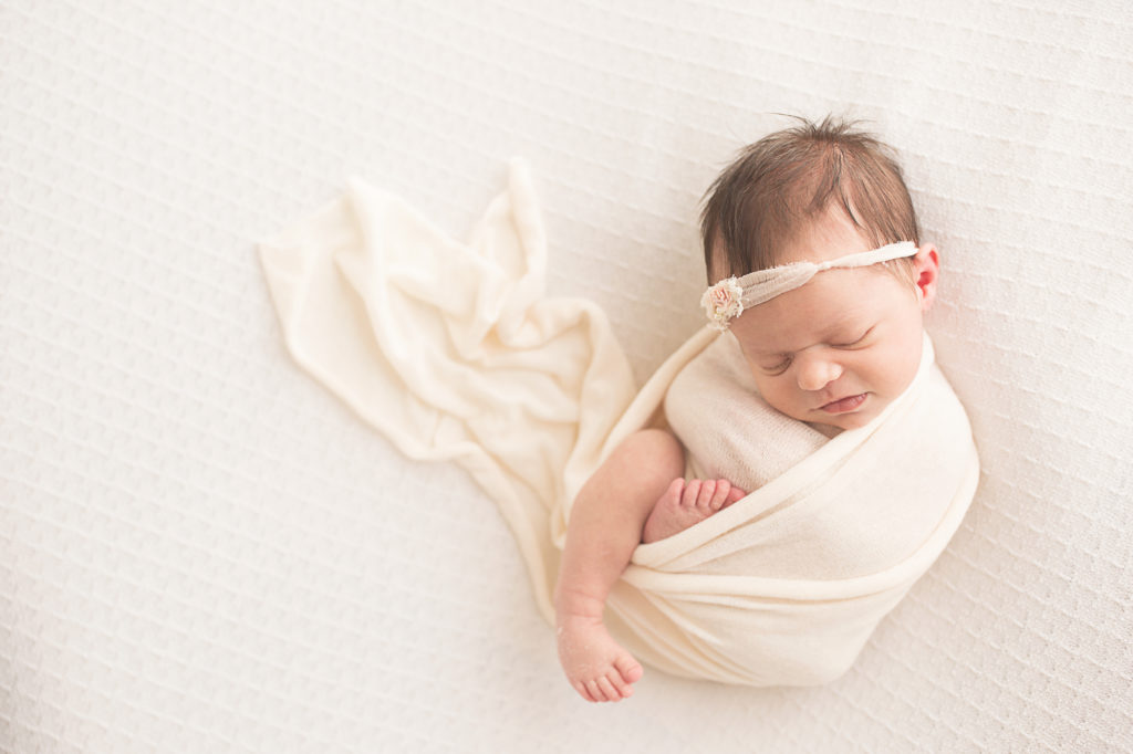 yukon oklahoma newborn photographer baby swaddled in white