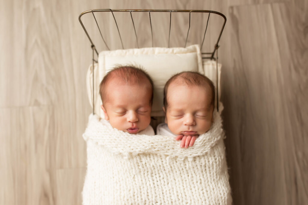 newborn twins at their newborn session in oklahoma city