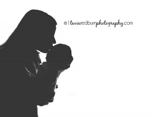mom and baby newborn girl silhouette