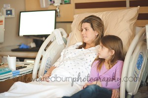 mom and daughter sitting during labor