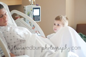 son supporting mom during her labor for daughter's birth in edmond ok