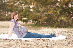 maternity photo of mom sitting, cute belly