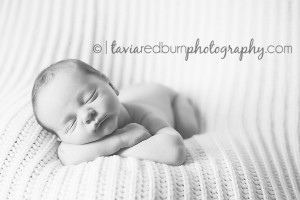 black and white posed newborn boy