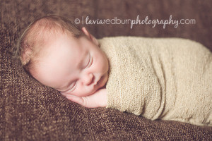 wrapped and swaddled newborn baby boy