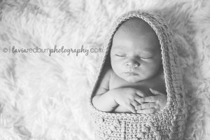 black and white posed sleeping newborn baby boy