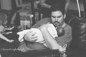home birth, dad with baby boy