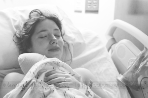 so sweet, mom snuggling her daughter for the first time