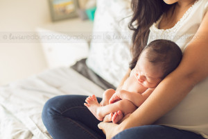 mom holding her newborn baby boy