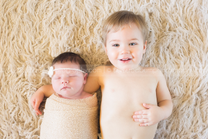 newborn sister and big brother, cute pose