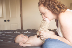 mom playing with new daughter pose lifestyle