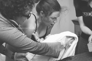 mom seeing her baby for the first time homebirth