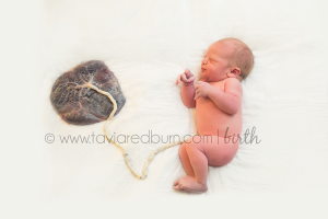 oklahoma city birth photographer baby attached to placenta