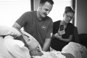 mom pushing during natural delivery, okc photography