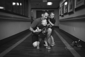 big brothers and dad going to see baby for the first time