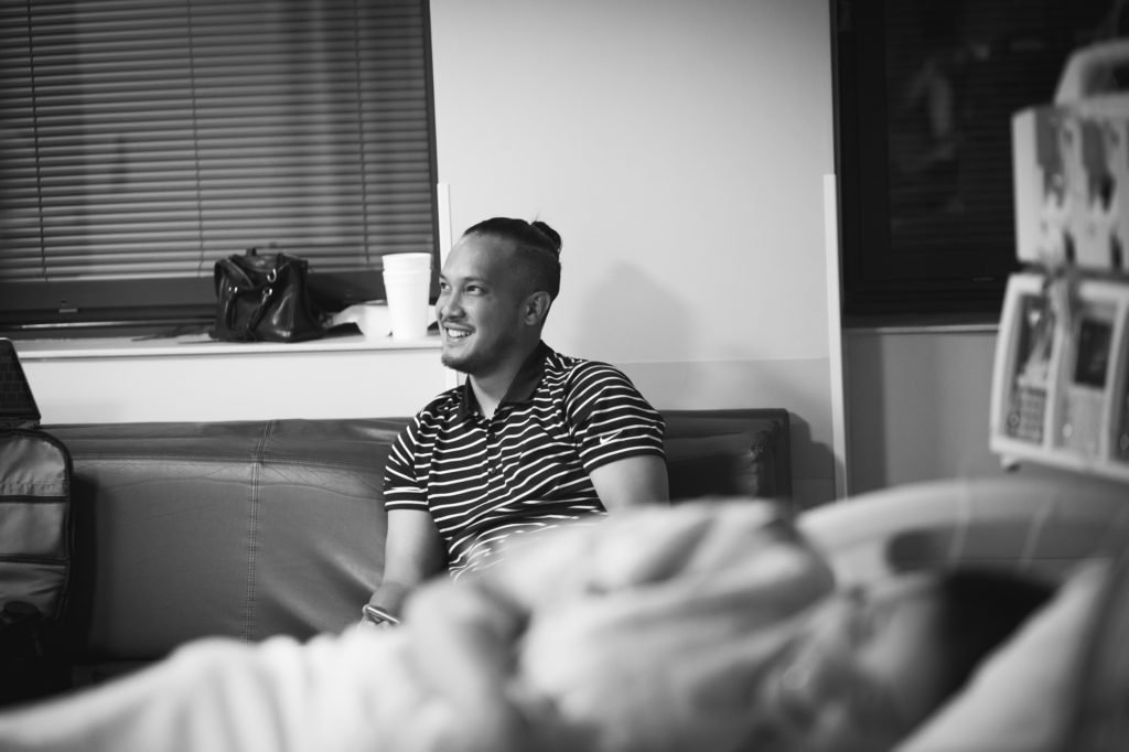 dad laughing while wife in labor, oklahoma birth
