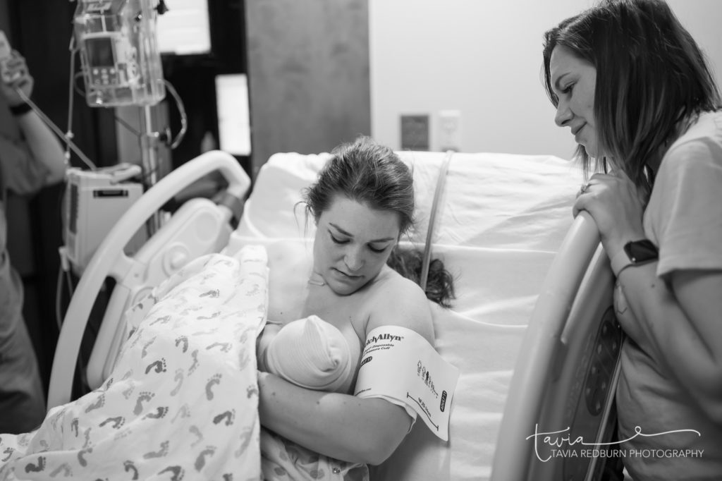 breastfeeding myths, a new mom breastfeeding her baby for the first time