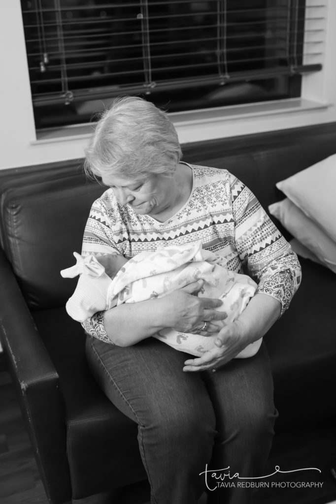 grandma with baby just born