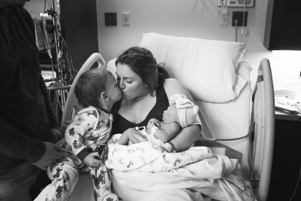 brother and sister in hospital birth