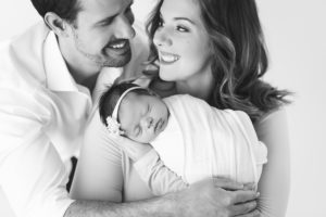 parents with their newborn in yukon oklahoma